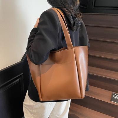 Damen Frühling und Sommer neue Pendler-Schultertasche mit großem Fassungsvermögen, lässige Mode, tragbare Tote-Bucket-Tasche