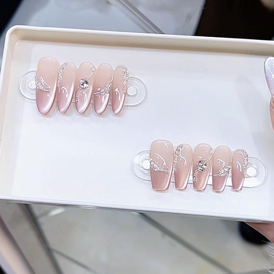 Handgewebte Rüstung Neue Rosa Hühnerohren im Frühling und Sommer Kühl und Sommer Eis-Transparentes Katzenaugen-Nageldesign