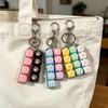 Tragbar Silikon Katzenpfote Clicker Schlüsselanhänger LED-Licht Leuchtend Fidget Spielzeug Tastaturstil Taste Stress Angst Linderung Geschenk