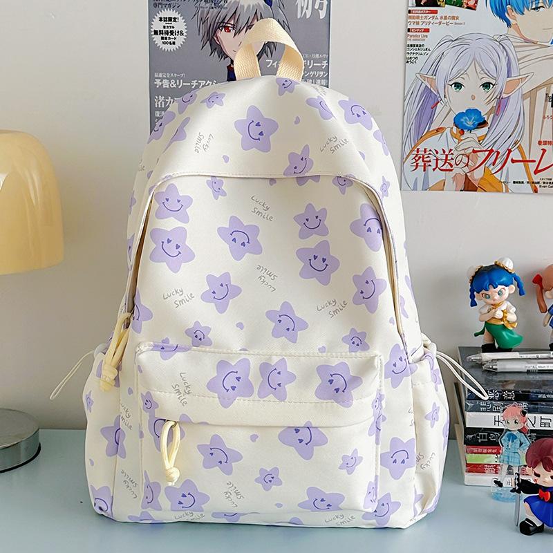 Nowy tornister jest wysokiej jakości, świeży, słodki i uroczy, a plecak w gwiazdki to lekki plecak podróżny dla uczniów gimnazjum.