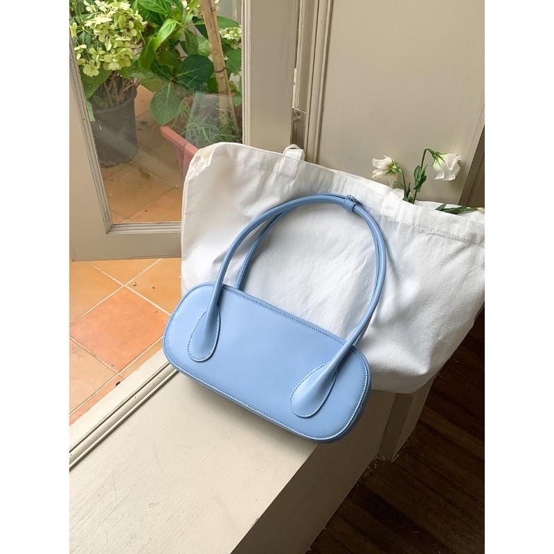 

Овальная сумка-багет женская новая однотонная простая портативная на плечо женская универсальная нишевая сумка подмышку синий