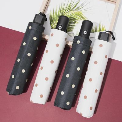 Ombrello pieghevole a pois neri con protezione UV – Design coreano piccolo e fresco per sole/pioggia