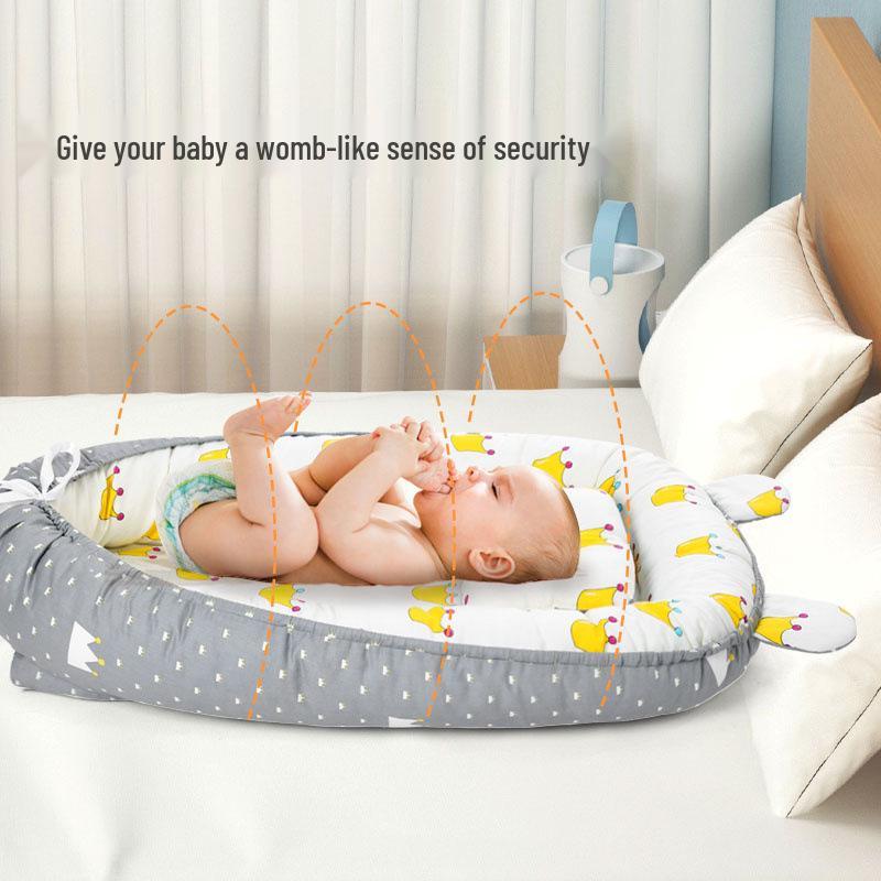 Tragbares Baby-Nestbett mit abnehmbaren waschbaren Stoßstangenpolstern - Faltbares und beruhigendes Design
