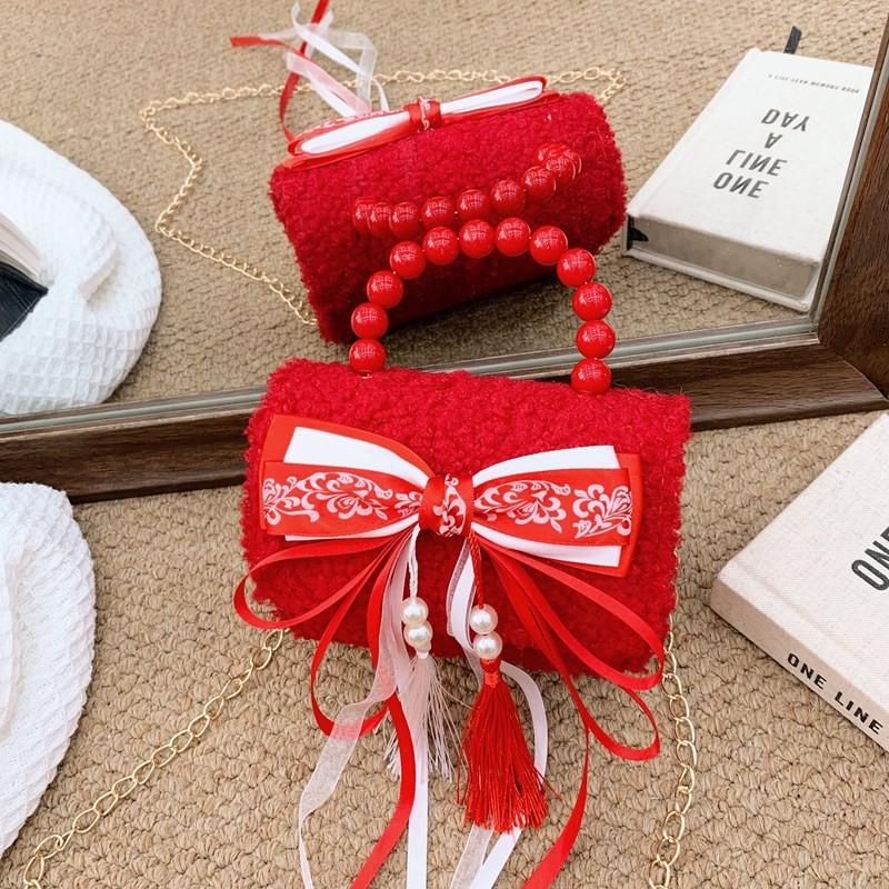 

Girls Enchanting Red Shoulder Bag With Chic Bow And Tassel Accents For Kids Red Bow Tassel