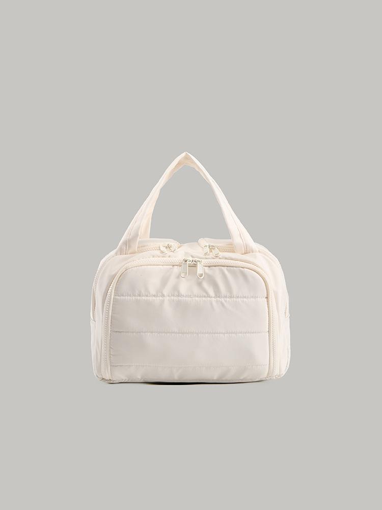 

Large capacity and convenient travel toiletry bag Korean sweet hand-held cosmetic bag women s sundries partition storage bag