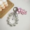 Korean Style Keychain Pendant: Metal Irregular Bow with Pearl Beads for Phone or Bag Accessories