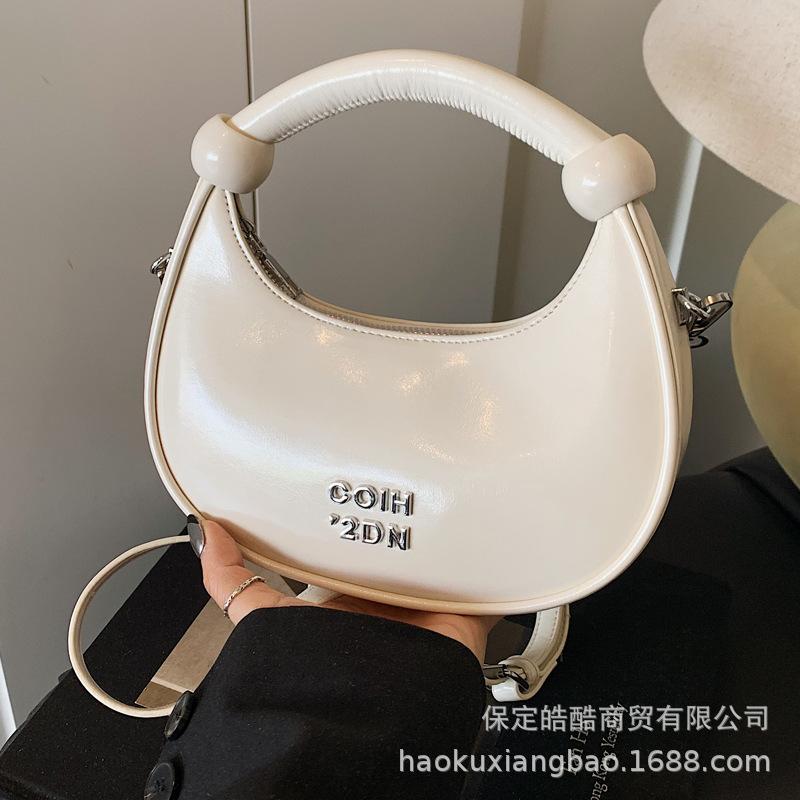 Super fire niche dumpling bag 2025 new spring and summer versatile shoulder messenger bag exquisite mini portable small bag