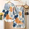 Women Plus Size White Printed Two Piece Set Round Neck Half Sleeve High Low Top Wide Leg Pants