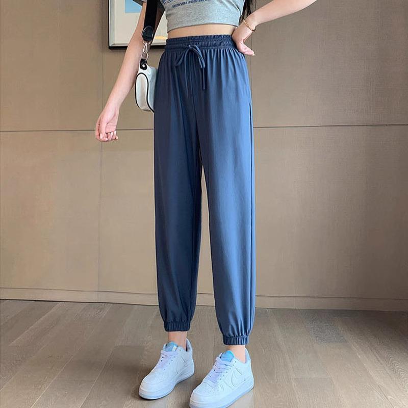 

Женские летние черные шелковые спортивные брюки - Большой размер, свободные, с манжетами на щиколотках, для фигуры типа груша L (suggested for 131-160 lbs) синий