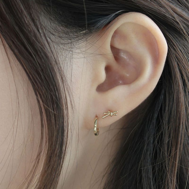 youngglow 14k tie ribbon piercing