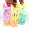 12PCS Children's Colorful Spring Ring Toys Mini Smiling Face Elastic Rainbow Ring Magic Toys Children's Birthday Party Gifts