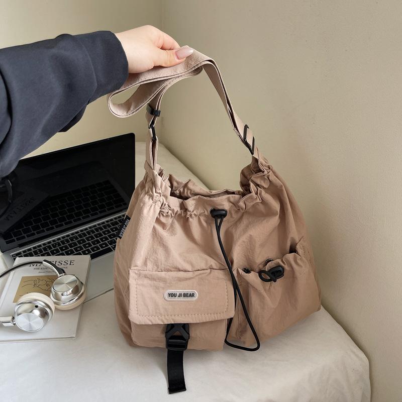 

Вместительная сумка-ведро на кулиске для женщин, новая модная сумка-кроссбоди через плечо, повседневная сумка с несколькими карманами на кулиске .