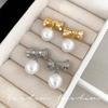 Sterling silver needle geometric splicing bow glass pearl earrings women's European and American style elegant and unique earrings tide