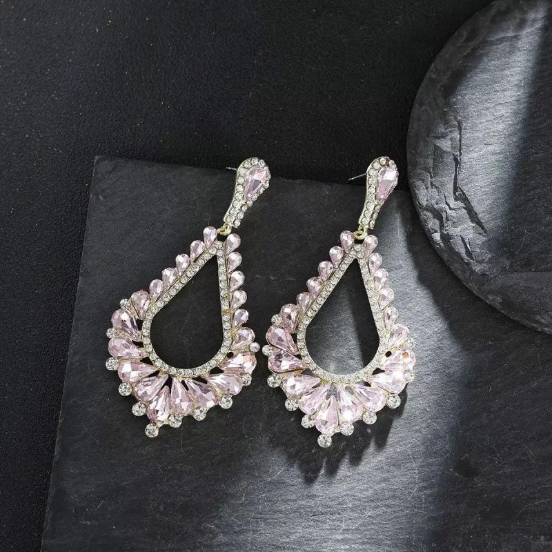 

Exaggerated and Unique Earrings, Stylish and Exquisite, Featuring Full Diamonds and Hollowed-out Droplet-shaped Pendants. рожевий