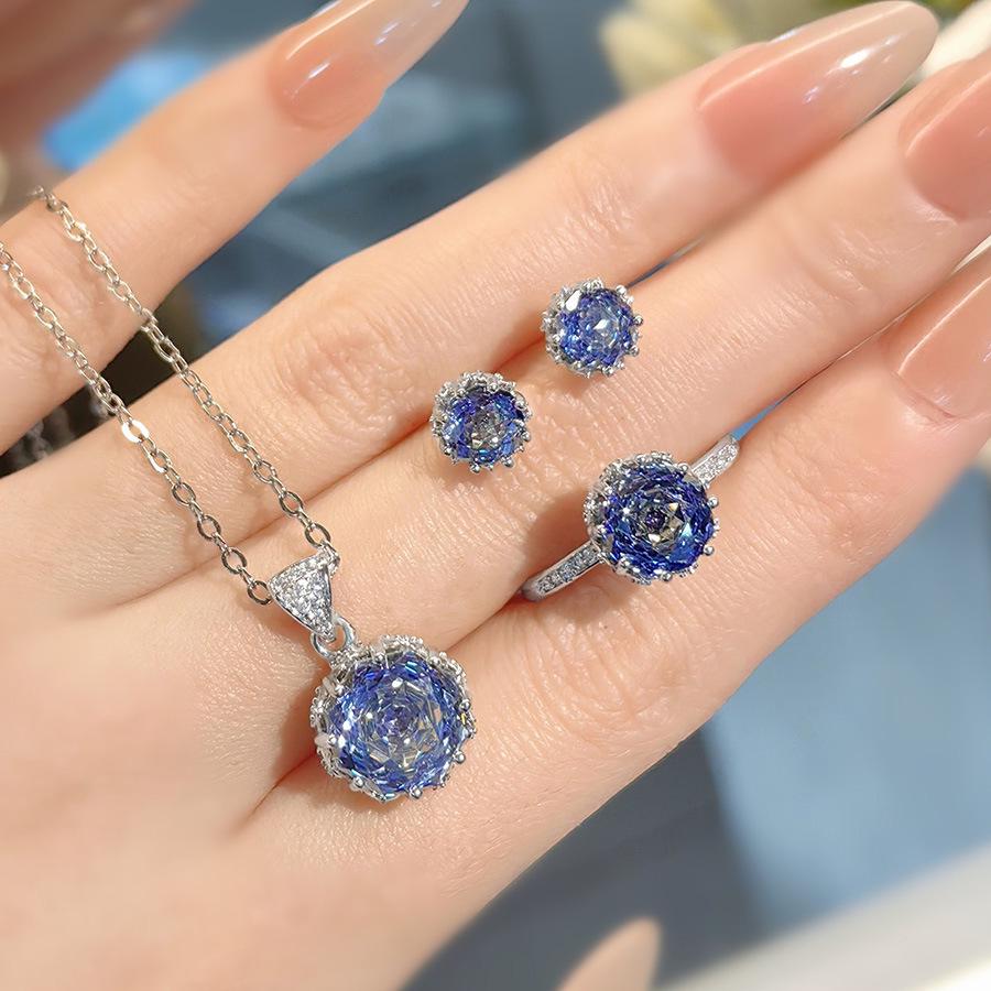 Octagonal Rose-Cut Tanzanite Pendant with High-Carbon Diamonds, Colorful Diamond Earrings, and Paraiba Ring