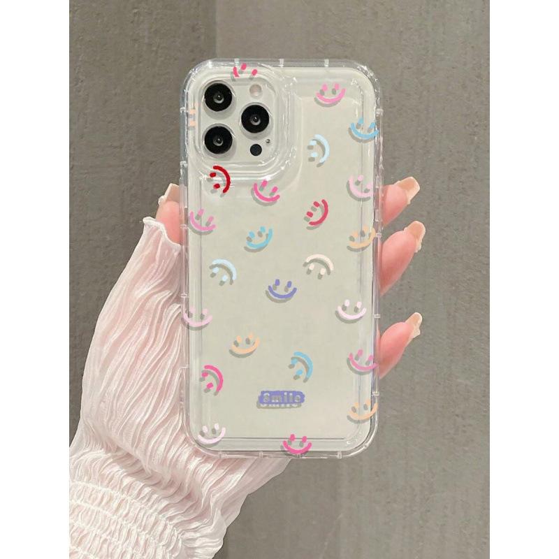 Colorful smiley face is suitable for Apple 16promax mobile phone case 15plus14 transparent 13 airbag 12 European and American explosion