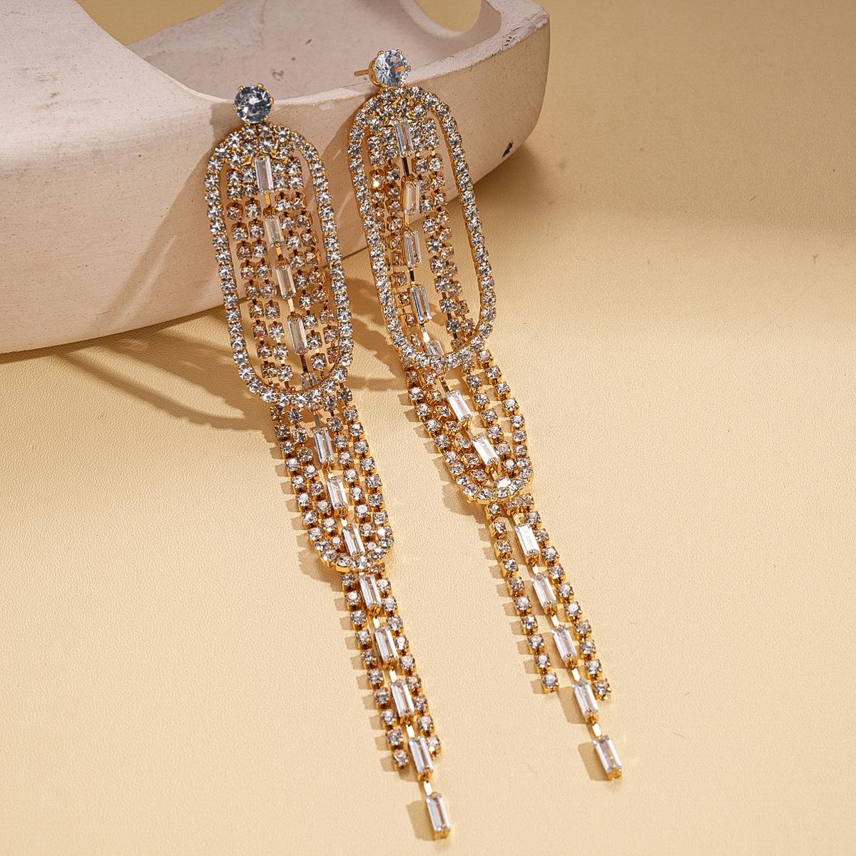 Diamond-encrusted hollow oval long fringed silver needle earrings temperament personalized fashion earrings