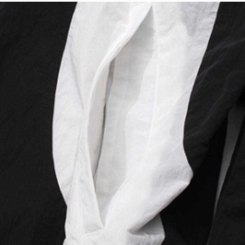 Reebok Rival Anorak Double Curve