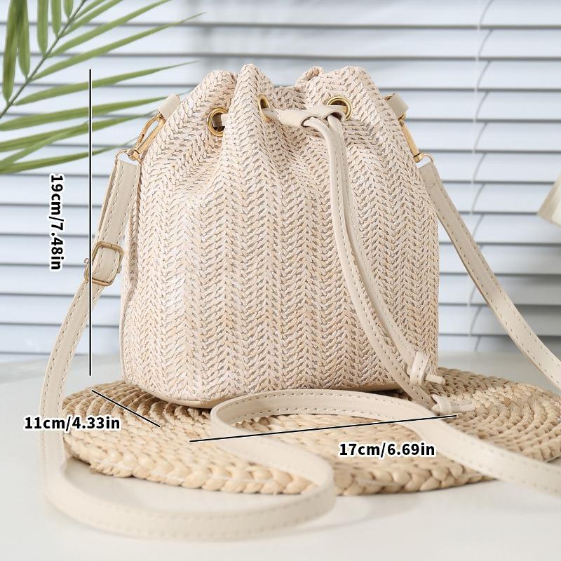 Bohemian Beige Straw Woven Bucket Crossbody Bag with Drawstring Closure Adjustable Leather Strap, Ideal for Beach Casual Daily