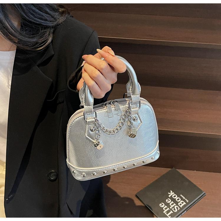 Popular portable shell small bag women's 2025 new high-end rivet saddle bag fashionable shoulder messenger bag