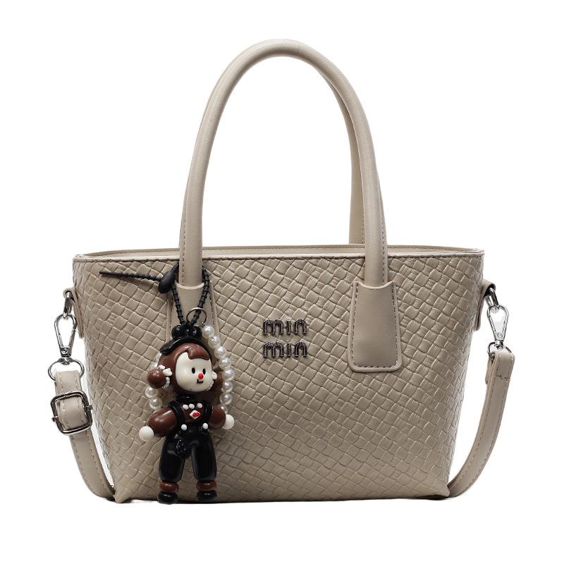 

Korean version of the hot sale, design sense, woven pattern temperament, portable bucket bag, women s leisure commuting versatile fashion messenger b