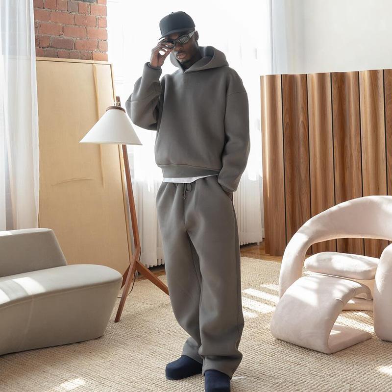 Europa e Stati Uniti moda casual semplice per coppie felpa con cappuccio felpa con cappuccio colore solido larga felpa con cappuccio all'ingrosso