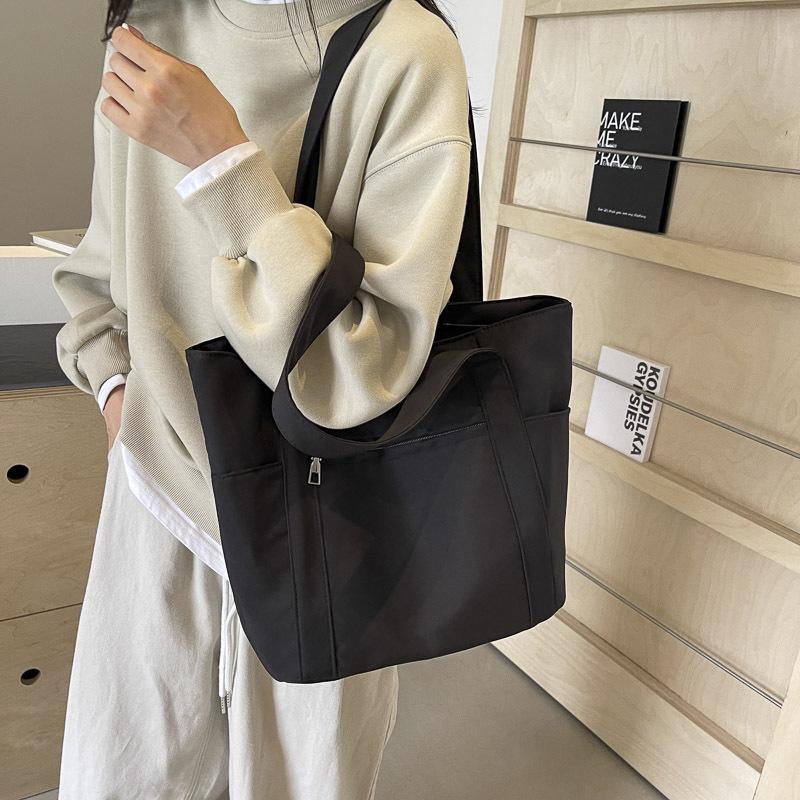 Simple commuter leisure large-capacity tote canvas bag high-value literary college student class women's shoulder bag bag