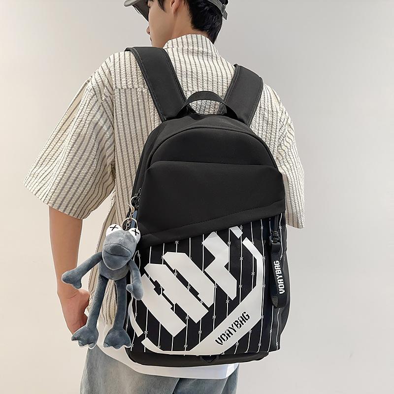 College student schoolbag is simple and large-capacity, junior high school student travel backpack, trendy and casual backpack, student schoolbag.