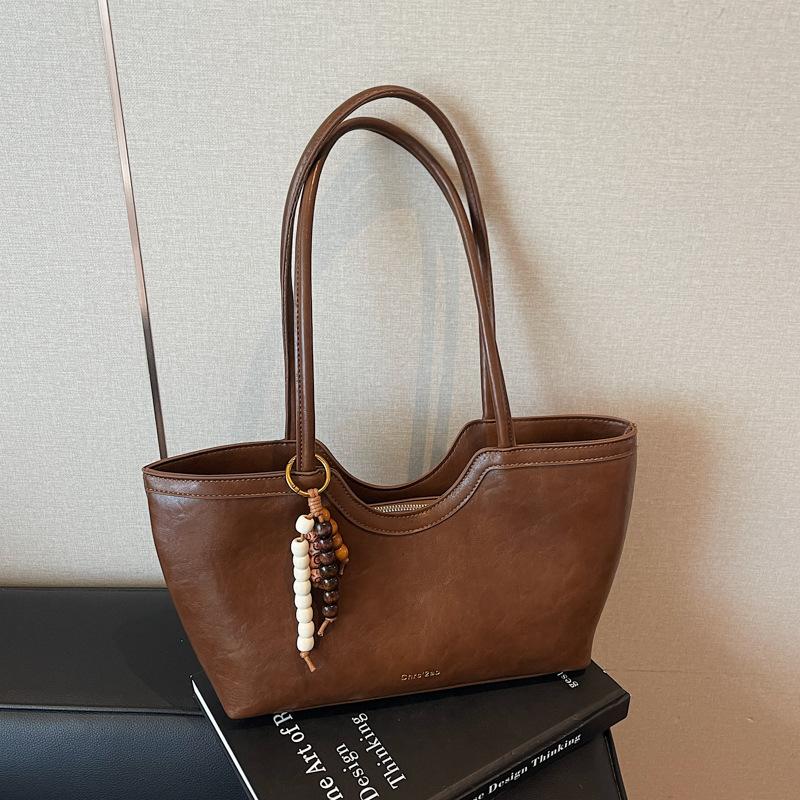 Large-capacity commuter tote bag women's 2025 autumn new retro handbag fashionable shoulder armpit bag