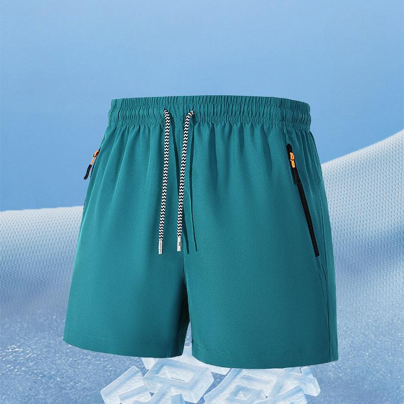 

Мужские спортивные трикотажные шорты с завязками на шнурке и эластичным поясом. Быстросохнущие дышащие летние спортивные шорты. M зелёный