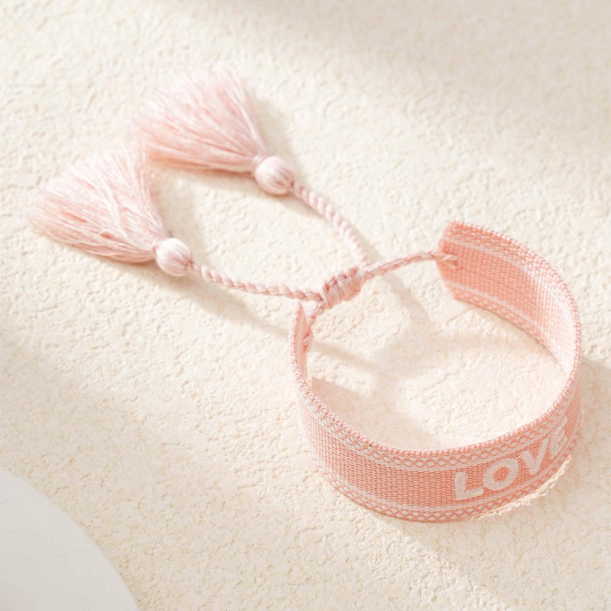 Handwoven Bohemian Tassel Bracelet: Women s European & American Letter Embroidery Wristband & Couple Style розовый