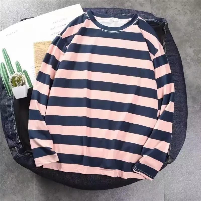 Camiseta de manga larga a rayas clásica de moda para jóvenes, top básico suelto artístico para hombre, estilo casual deportivo de primavera y otoño, top para hombre