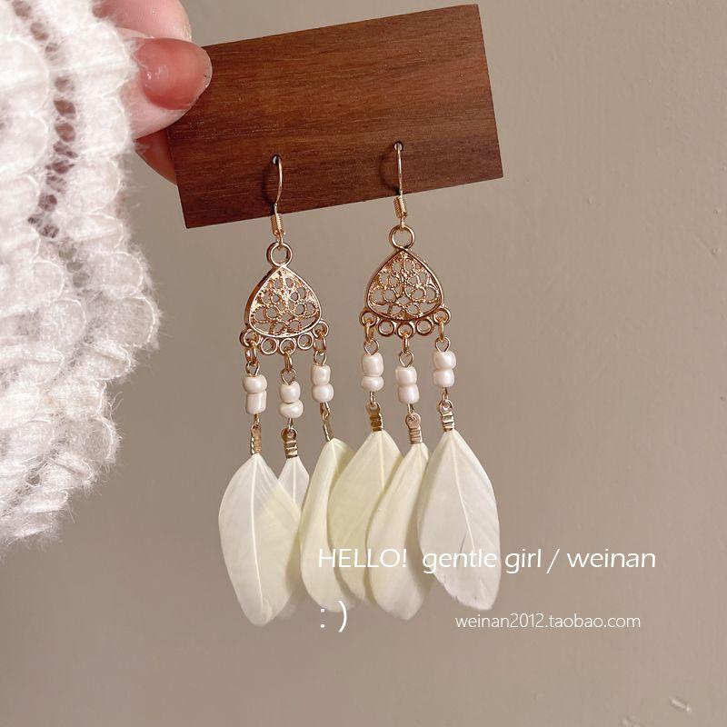 

Milk Series Mosquito Coil Ear Clip Girlish Style Travel Feather A pair of rice white ear hooks