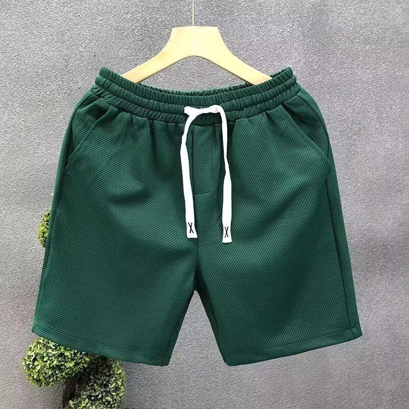 

Простые и универсальные белые шорты мужская летняя одежда однотонные пятиточечные спортивные штаны для мужчин свободные пляжные штаны 3XL зелёный