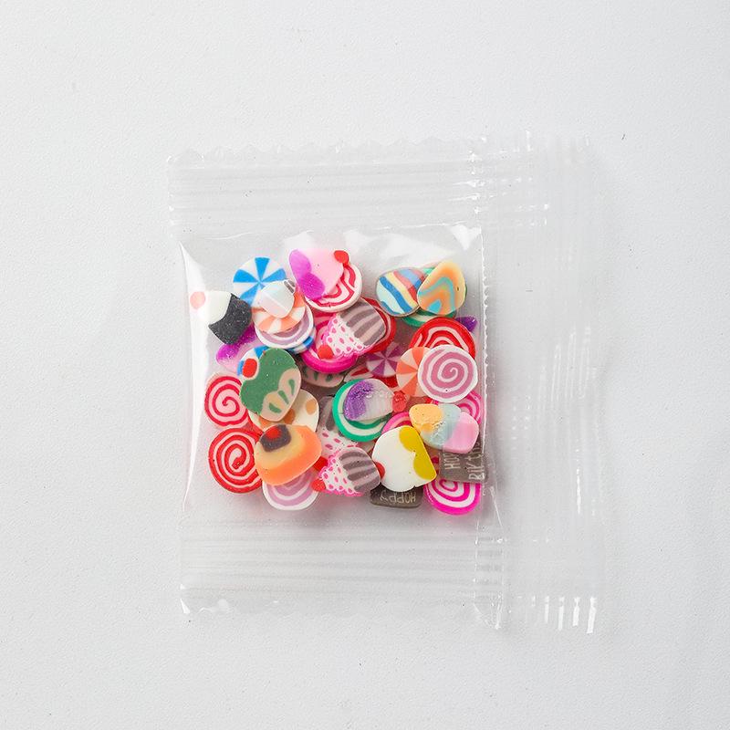 Cartoon Polymer Clay Slices: Butterfly, Flower, Moon Shapes for DIY Nail Art Accessories.