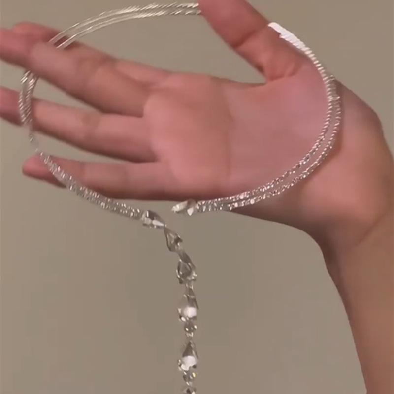 Explosive multi-layer oval zircon pearl necklace, simple design sense, temperament, clavicle chain, light luxury, personalized versatile item