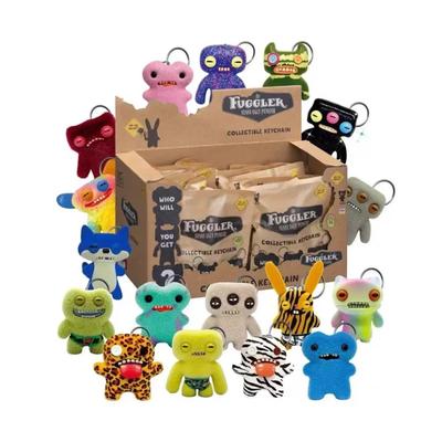 A figura original Fugler brinquedo caixa surpresa monstro de dentes feios engraçado Fugler boneco de ação modelo boneca presente crianças.