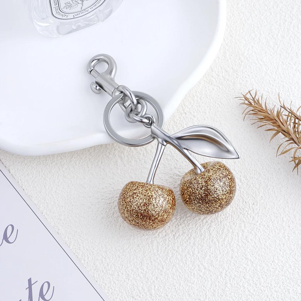 Funkelnder Goldener Kristallkirschen-Anhänger für Tasche Harz-Kirschen-Anhänger Geldbörsen-Schlüsselanhänger-Charm Festlicher Weihnachtsbeutel-Zubehör