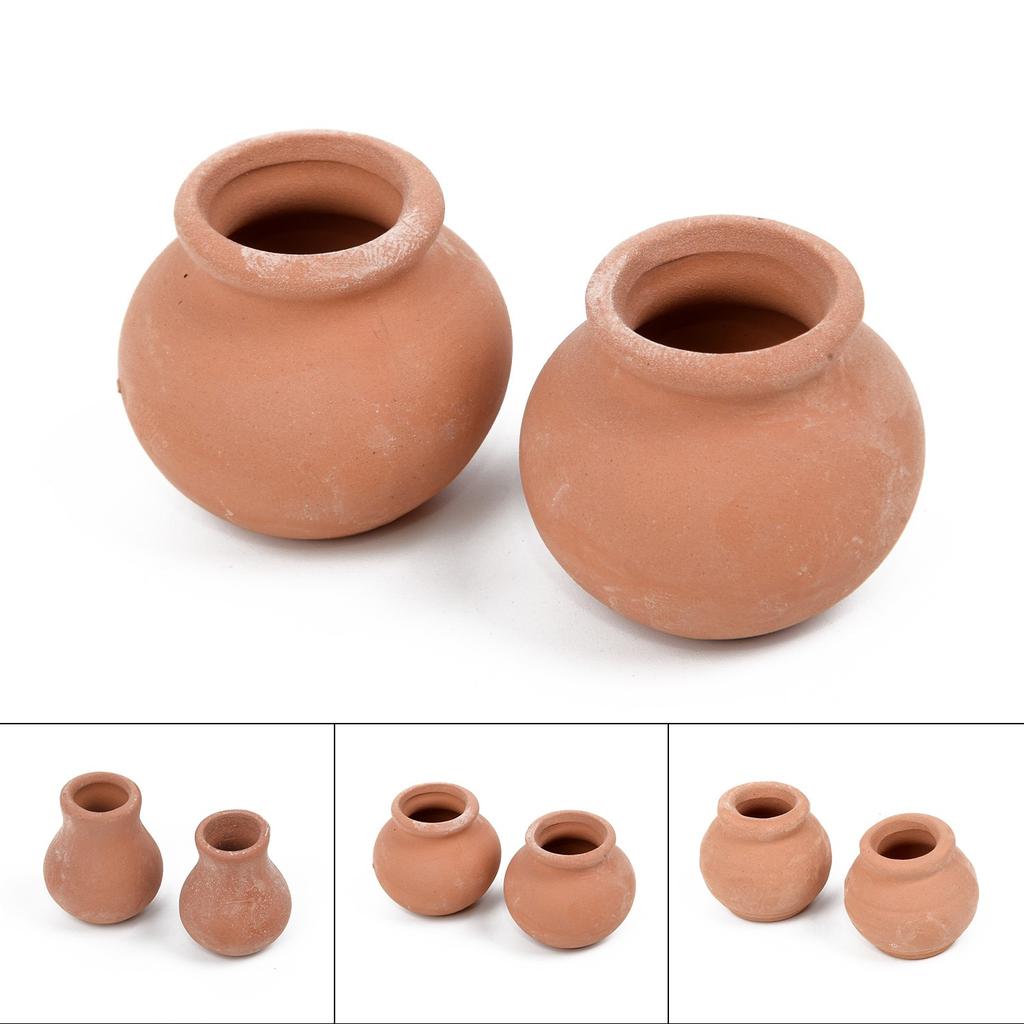 Set mit 2 Mini-Blumentöpfen aus Ton für Projekte im Klassenzimmer oder als Dekoration für das Zuhause.