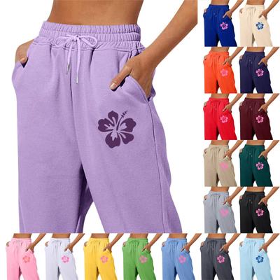 Calças femininas casuais com bolso e cordão, estampadas em cores sólidas e primavera