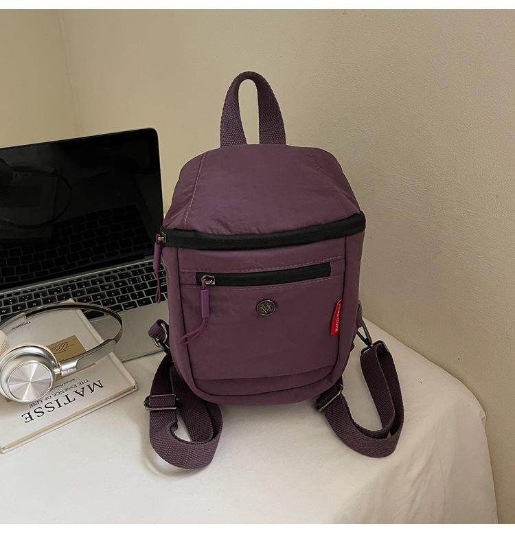 

Simple and stylish small backpack outdoor leisure shopping bag new leisure niche design travel backpack tide фиолетовый