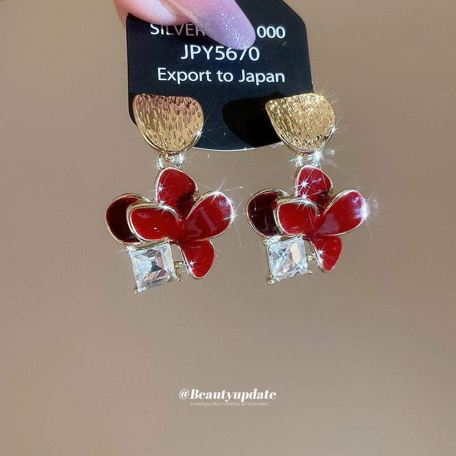 Silver Needle Rhinestone Drip Oil Flower Earrings - Elegant, Versatile, High-End Dangle Jewelry.
