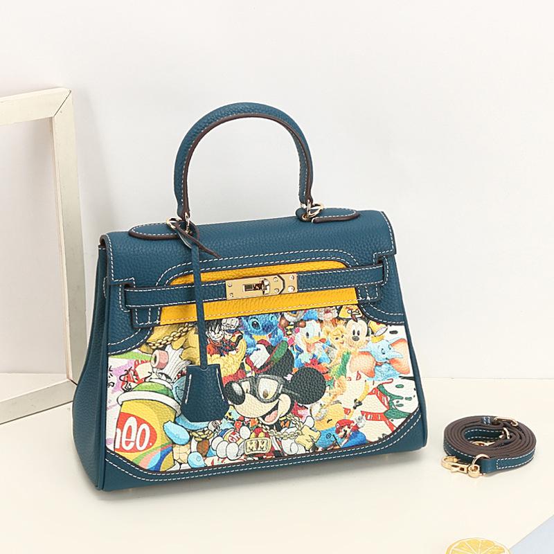 Neue Mode Vielseitige Bedruckte Graffiti Kelly Tasche Echtes Leder Cartoon Kontrastfarbe Erste Schicht Rindsleder Ein Schulter Crossbody Handtasche