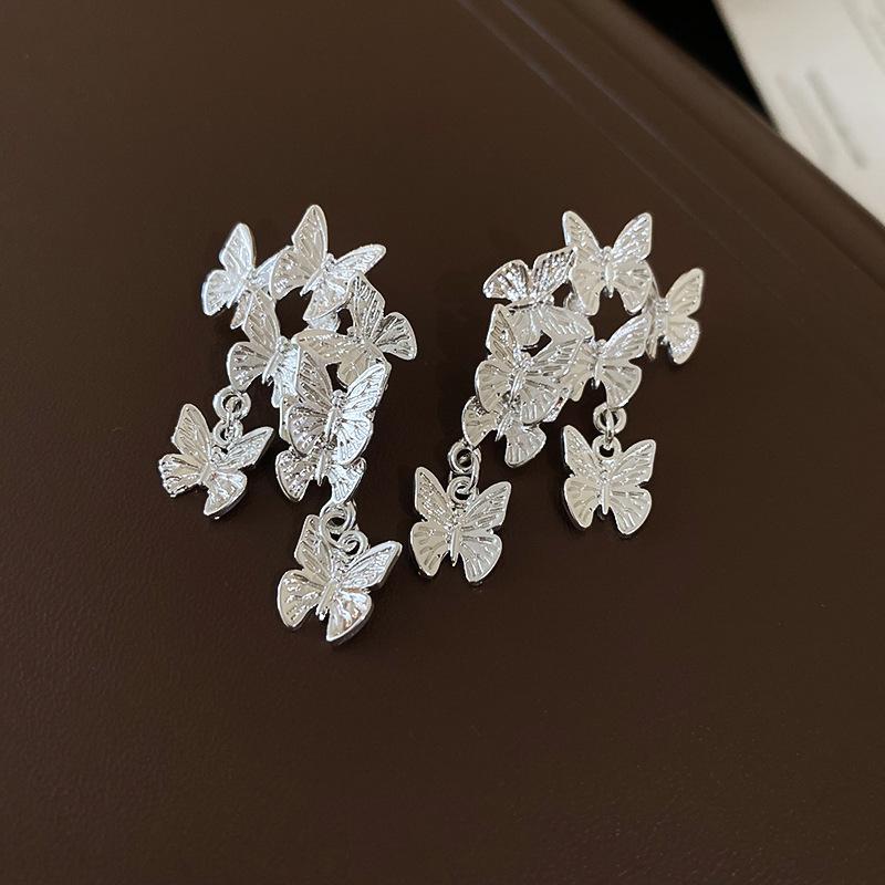 2024 Trendy French Retro Butterfly Tassel Earrings: Elegant Metal Studs