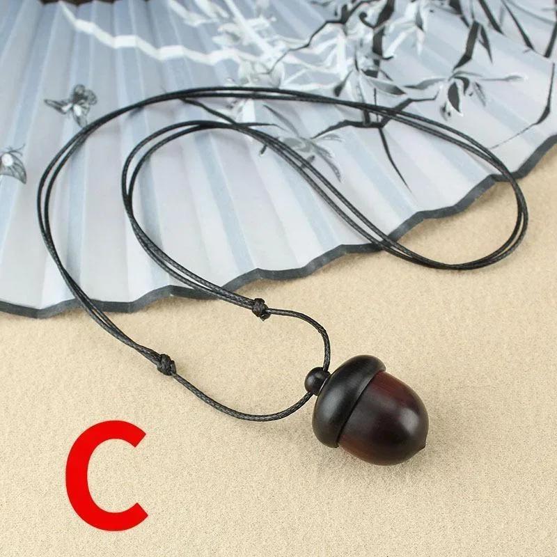 

1 шт. Винтажная завинчивающаяся коробочка-подвеска из эбенового дерева в форме желудя, длинное ожерелье, дизайн желудя и сосновой шишки, ювелирные изделия, художественные украшения в виде бутылочки желаний C