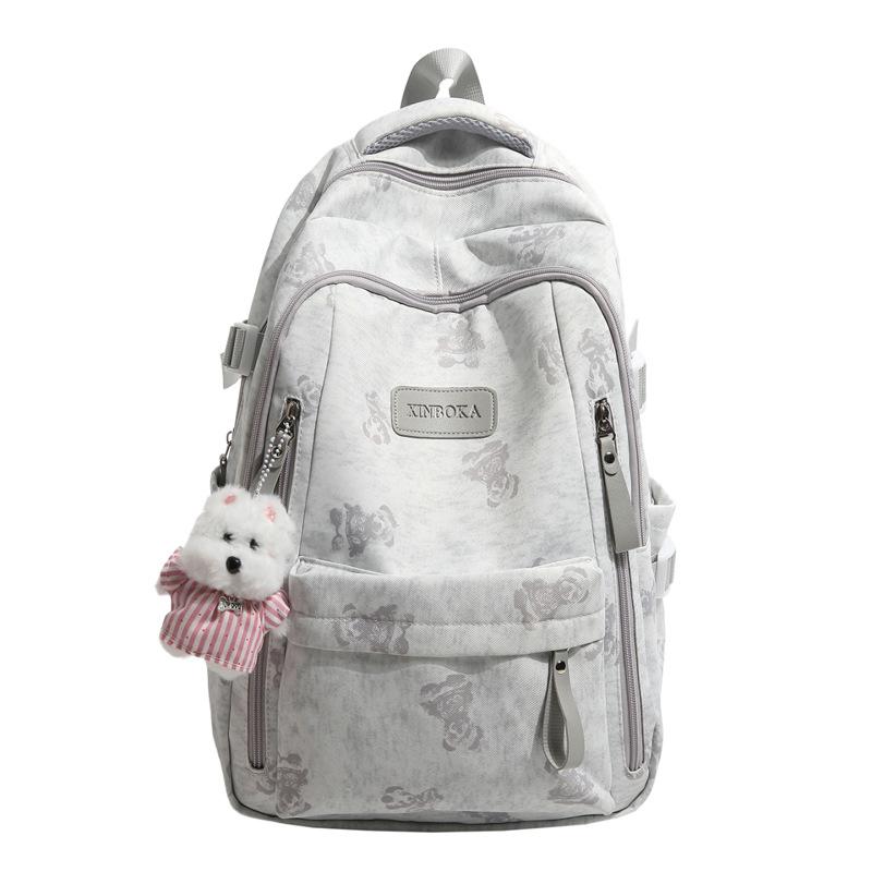 High value schoolbag female junior high school student high school student backpack college student campus printing large capacity backpack