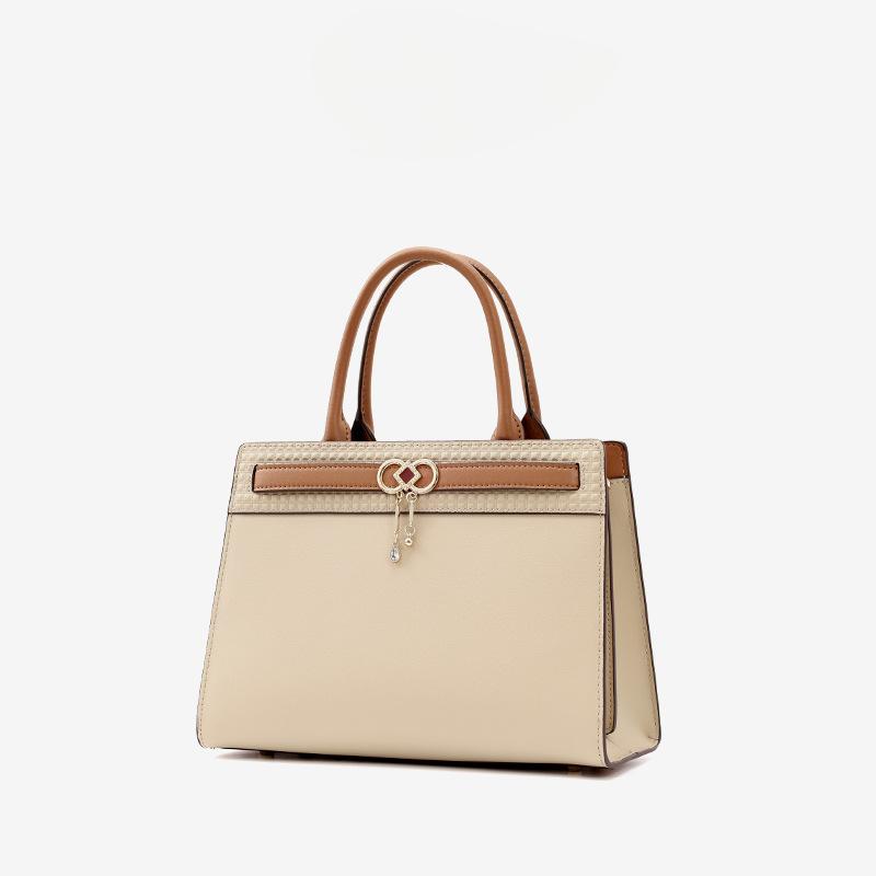 

New solid color women s bag, new art design fashion hardware women s handbag, high-quality feel shoulder messenger bag 28*12.5*20cm