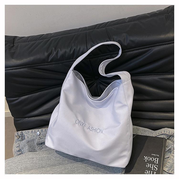 

Japanese nylon cloth bag women s spring 2025 new student commuting casual versatile bag niche shoulder bag синий