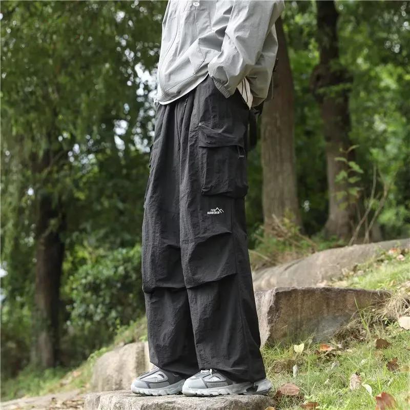 Men's Spring Mountaineering Waterproof Rushing Pants Youth Handsome Loose Sports Work Pants