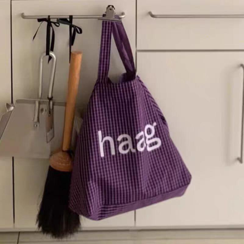 

Han Dai s new haaY imported fabric, grape purple street casual fashion plaid with alphabet canvas bag